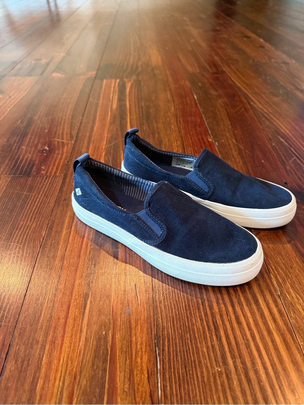 Sperry navy slip on shoes